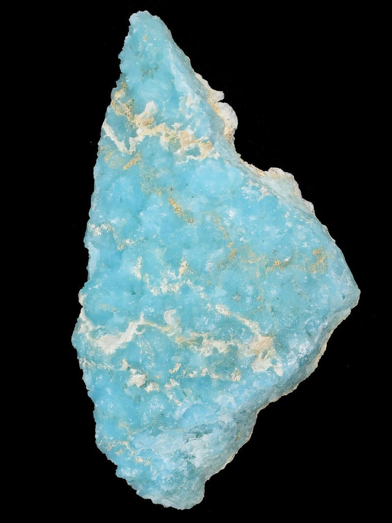 A cut Larimar slab photographed against a dark background.
