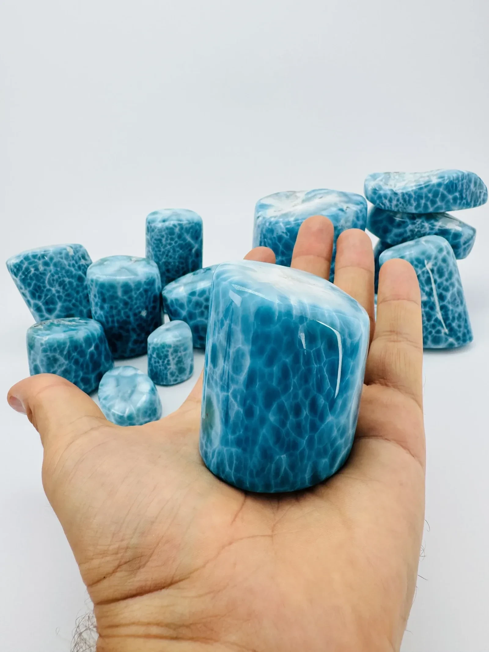 A group of polished Larimar towers and freeforms.