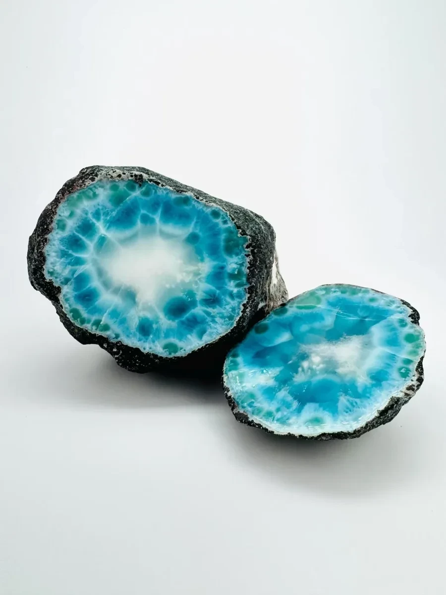 A matching pair of polished Larimar geode halves.